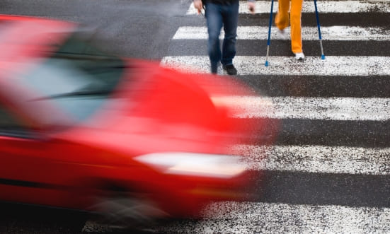 Car with pedestrians