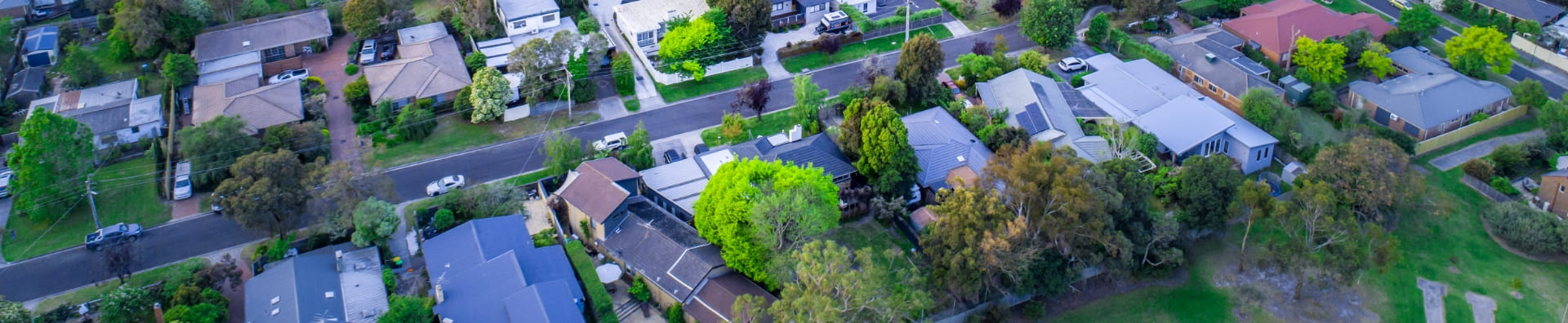 Residential area on ocean coastline at dusk