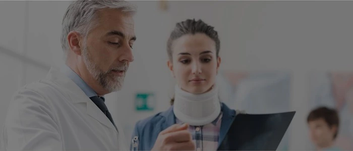 Doctor examining a patient's x-ray