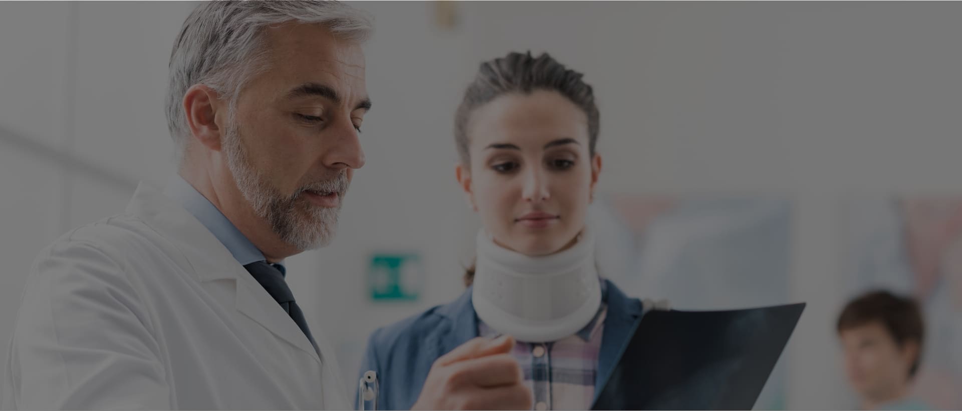 Doctor examining a patient's x-ray